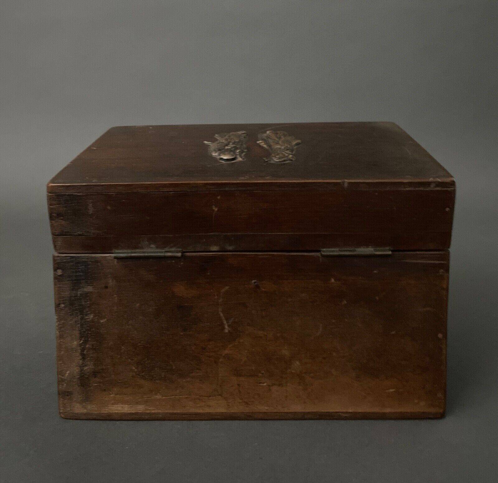 Two reel spools in their original 1900 box