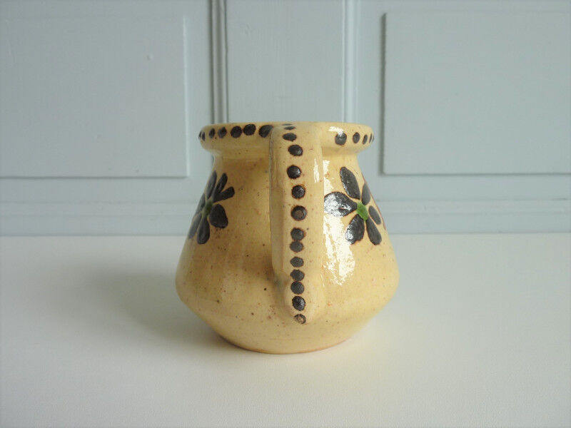 Ancient ceramic milk pot