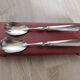 Silver-plated metal salad serving spoons in their vintage case