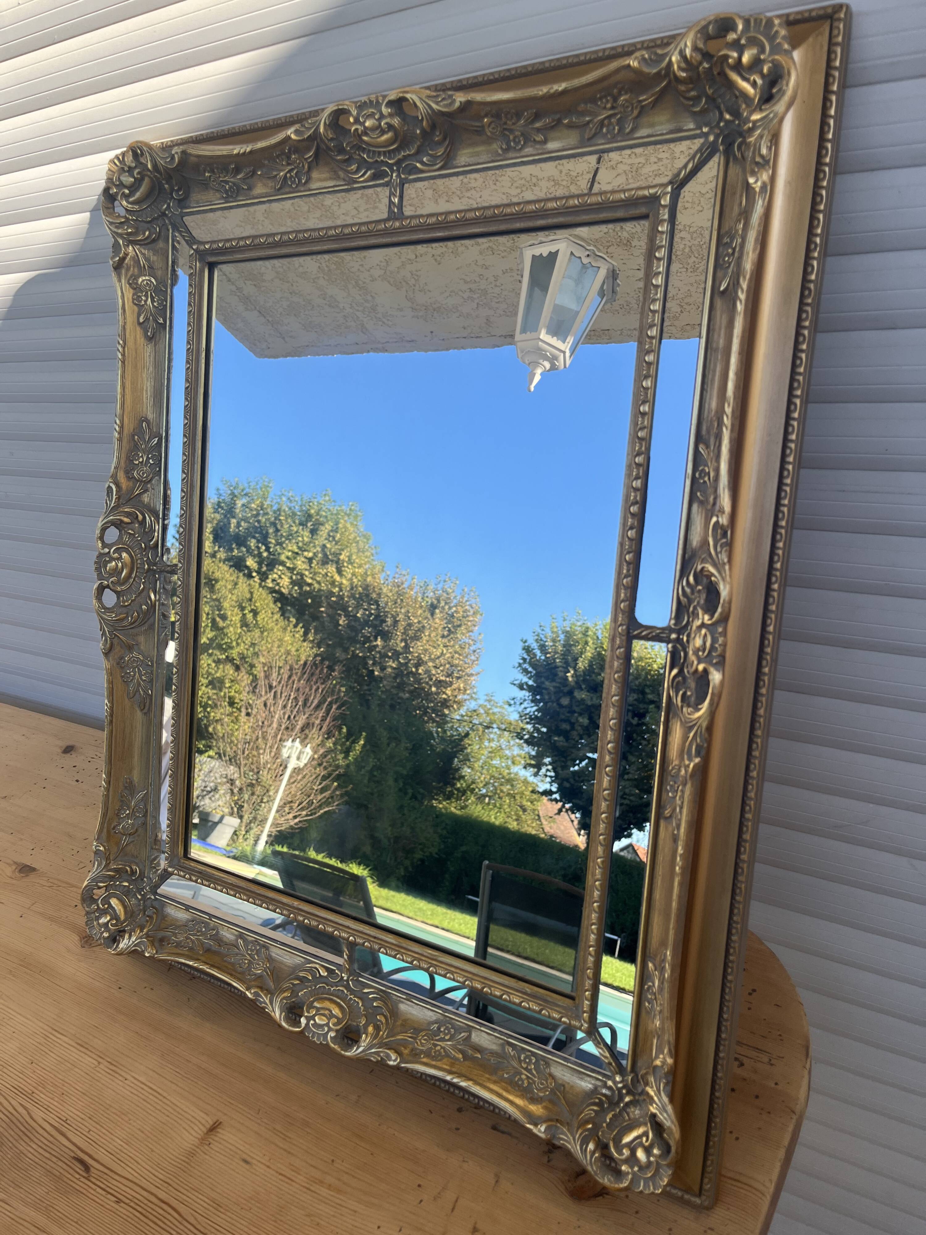 Golden mirror with a closed pore.