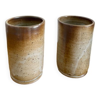 Two antique sandstone cups