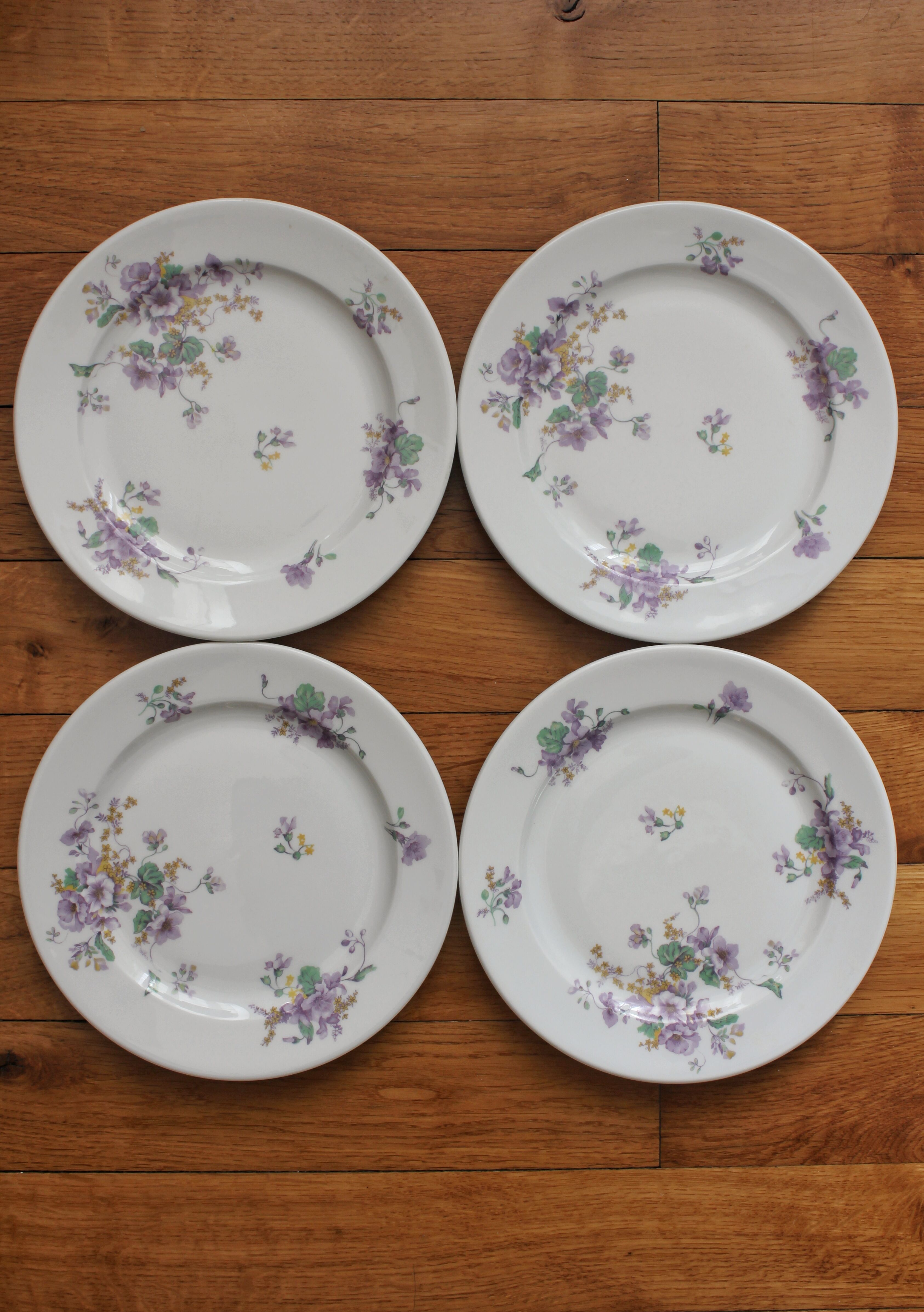 4 porcelain dessert plates decorated with flowers Bernardaud Limoges