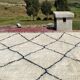 Very large vintage Beni Ouarain rug in cream wool with black diamonds, 426x344cm.
