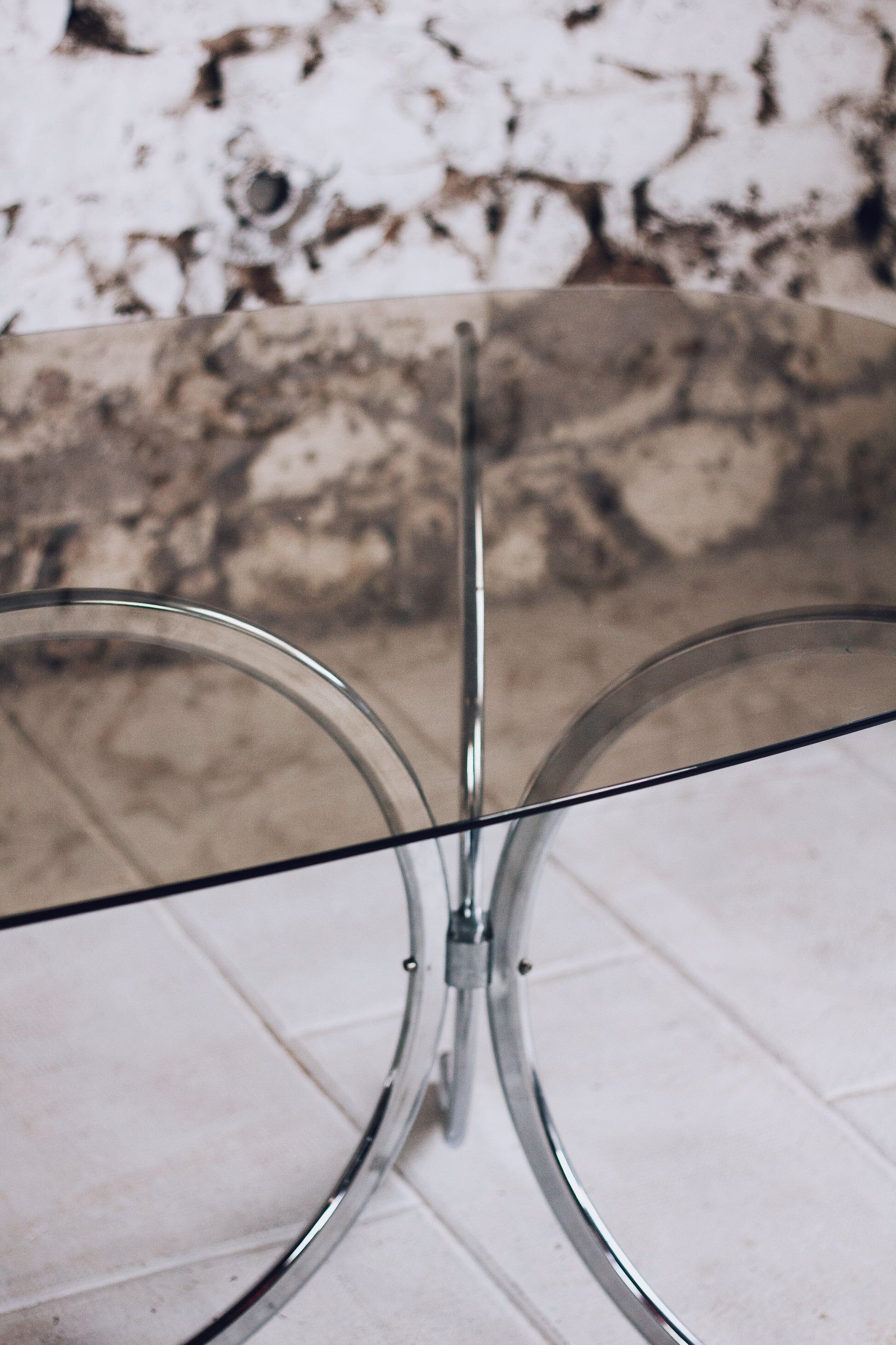 Chrome and smoked glass dining table in the style of Gastone Rinaldi, 1970.