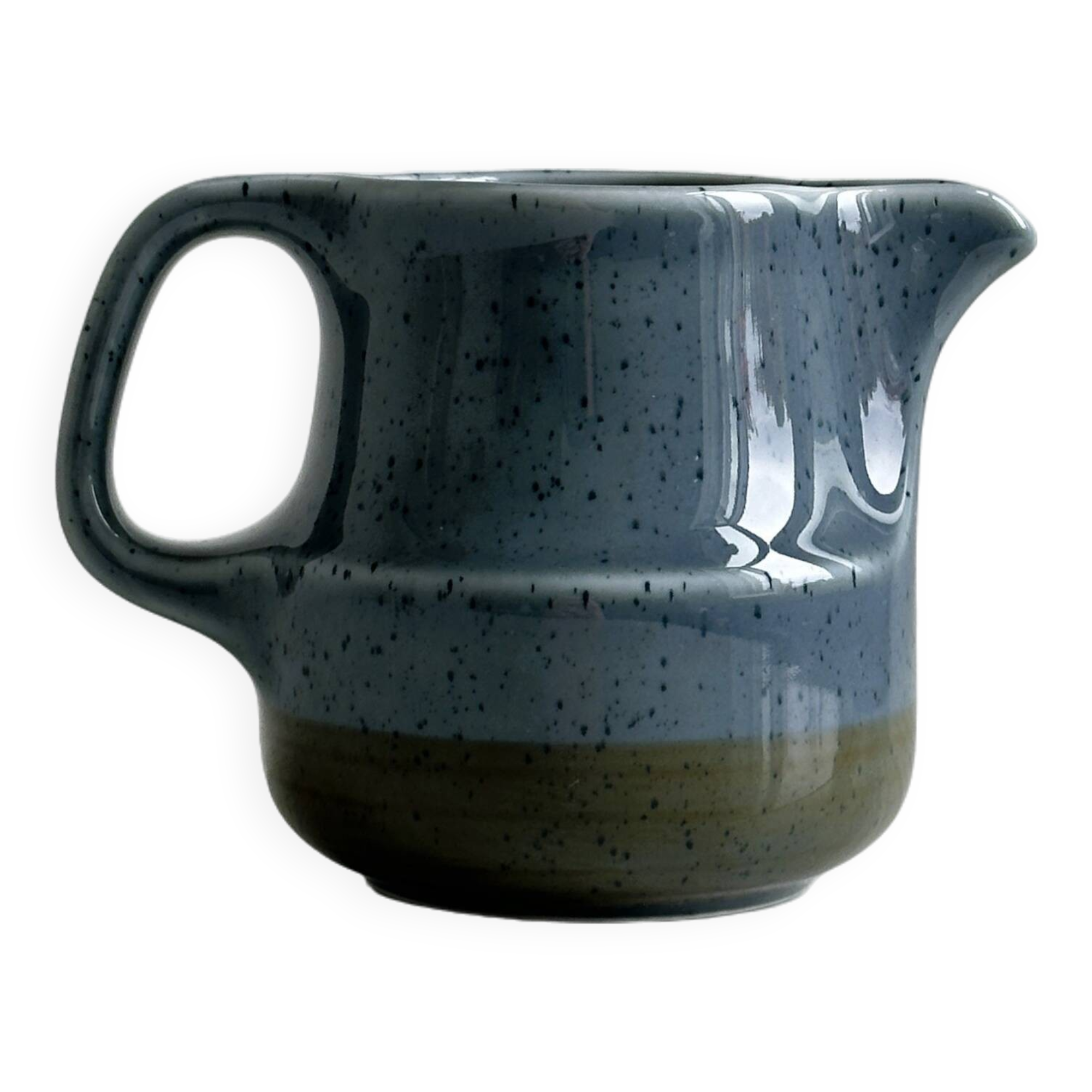 Blue and beige ceramic milk jug