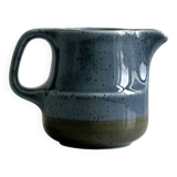 Blue and beige ceramic milk jug