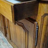 Two-body buffet from the Louis XV period in solid walnut, 18th century.