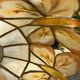 Suspension nacre et laiton papillons