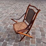 Bamboo folding chair and caning, leather and brass