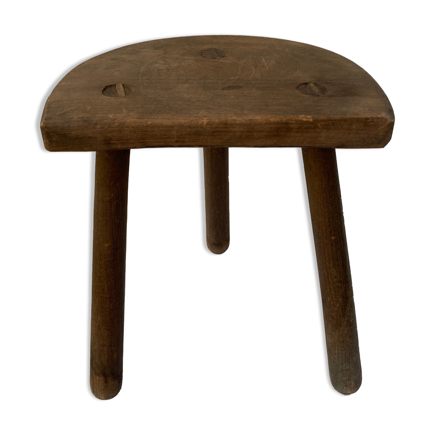 Old wooden tripod stool