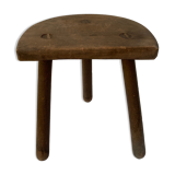 Old wooden tripod stool