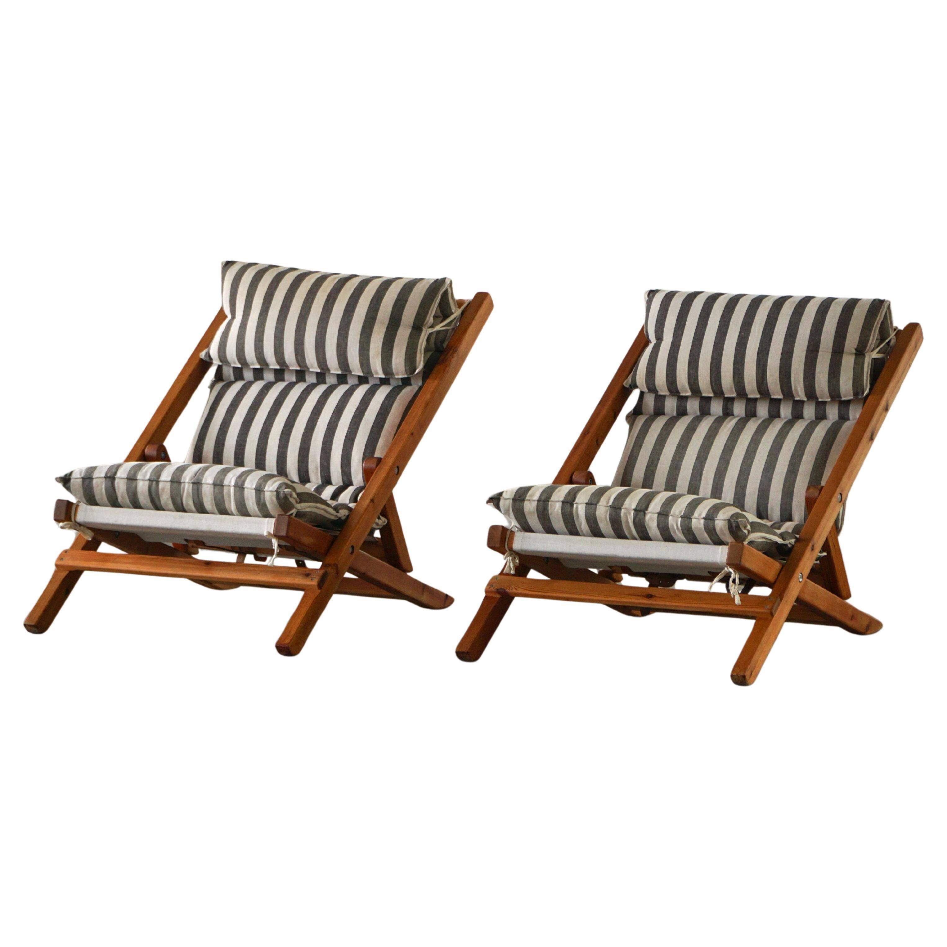 Mid-century dining/lounge chairs in pine and striped cotton canvas, Denmark, 1970s.