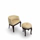 An antique Italian bar chair and a matching tufted vanity stool.