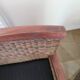 2 colonial-style armchairs in woven rattan and exotic wood