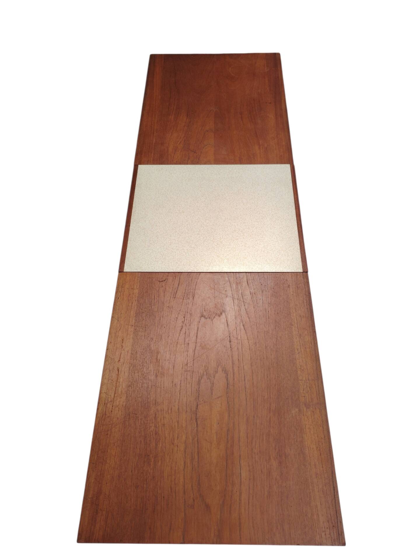 Vintage Scandinavian extendable coffee table with sled legs.