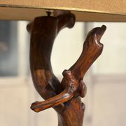 Floor lamp in solid olive wood, Brutalist style, French work from the 1970s.