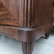 Art Deco bedside table with a green marble top.
