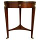 Empire guéridon table in mahogany with a black marble top and gilded bronze.