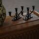 Early 20th century, pair of Danish Art Deco candlesticks in metal with three arms, 1930s.