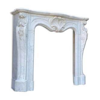 Louis XV style fireplace in Carrara marble