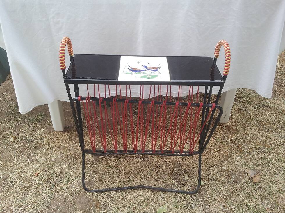 Porte revue fer forgé