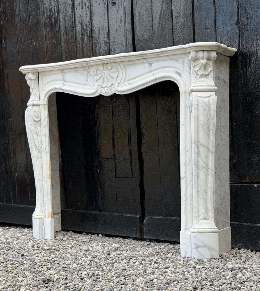 Louis XV style fireplace in Arabescato Carrara marble, circa 1880.