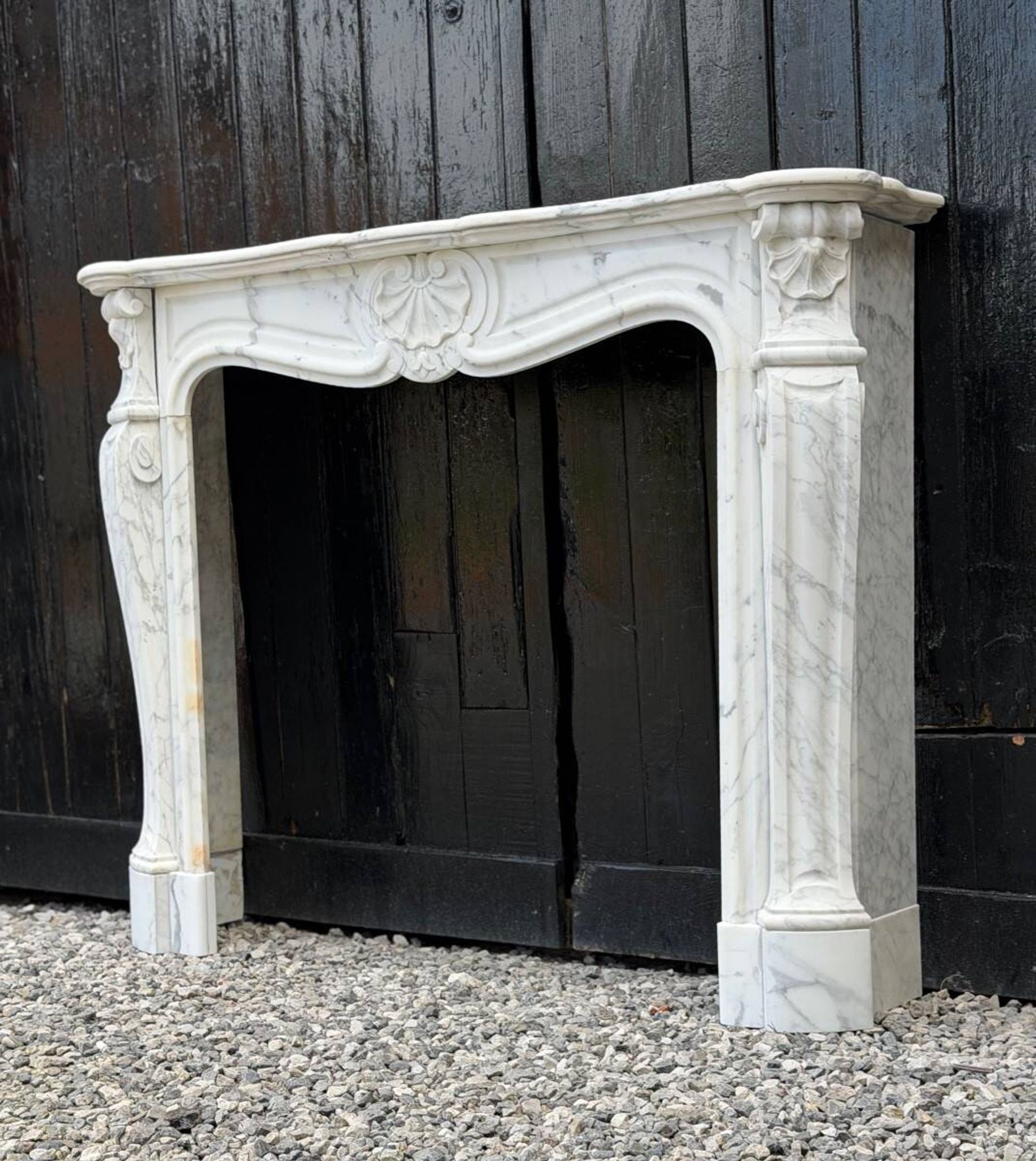 Louis XV style fireplace in Arabescato Carrara marble, circa 1880.