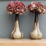 Pair of glazed sizzlings, signed