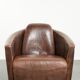 Cowhide armchair in Aviator design in a warm brown colour