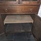 Vintage oak furniture with mesh doors.
