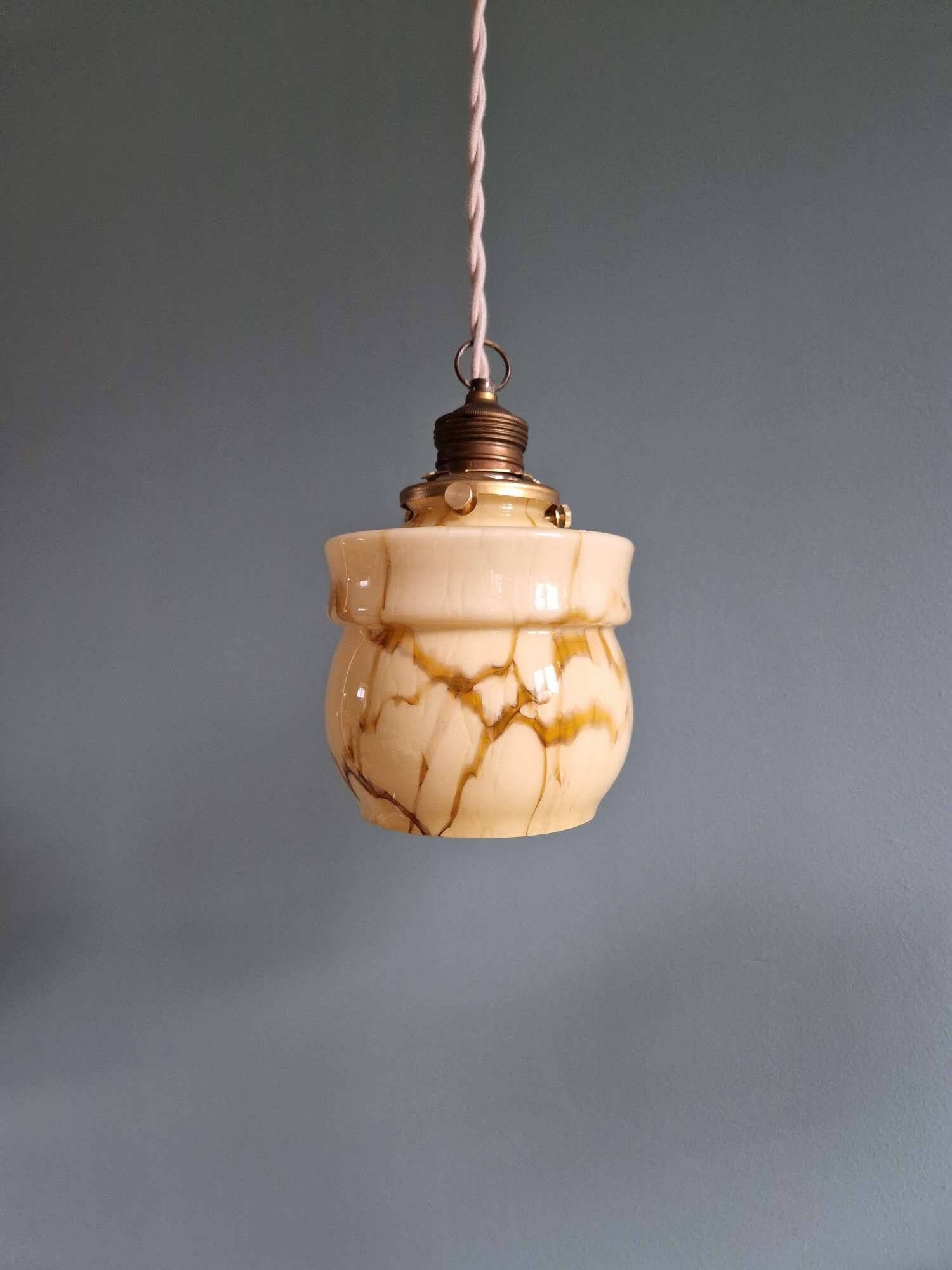 Art Deco trio of suspensions in opaline and marbled ouraline, Scailmont, 1920-30.