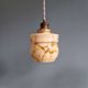 Art Deco trio of suspensions in opaline and marbled ouraline, Scailmont, 1920-30.