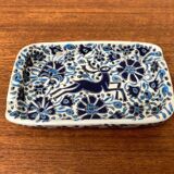 Vintage handmade blue ceramic ashtray with deer and flower ornament from Rodos Ceramics.