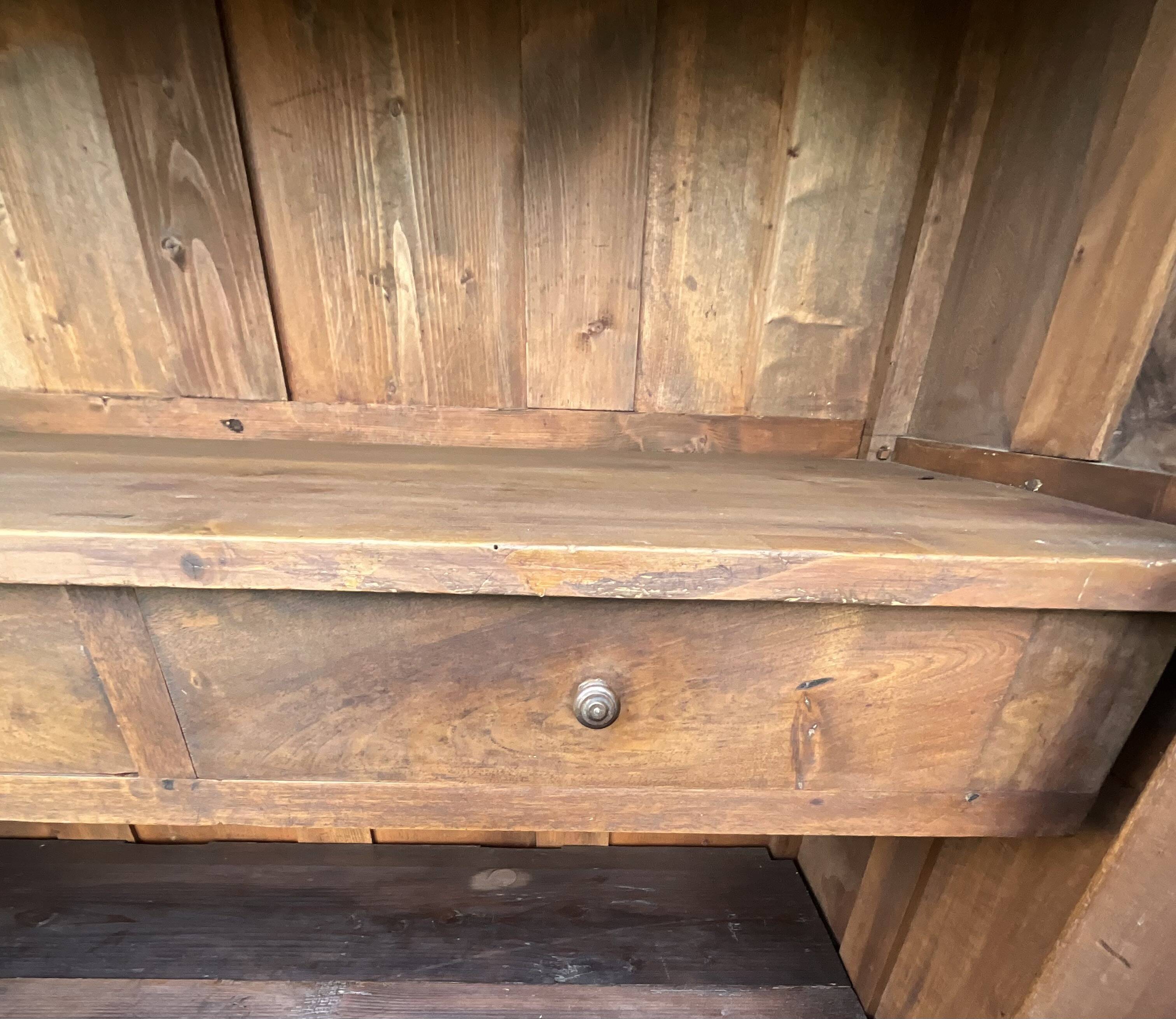 Empire wardrobe in solid walnut, France, mid-19th century.