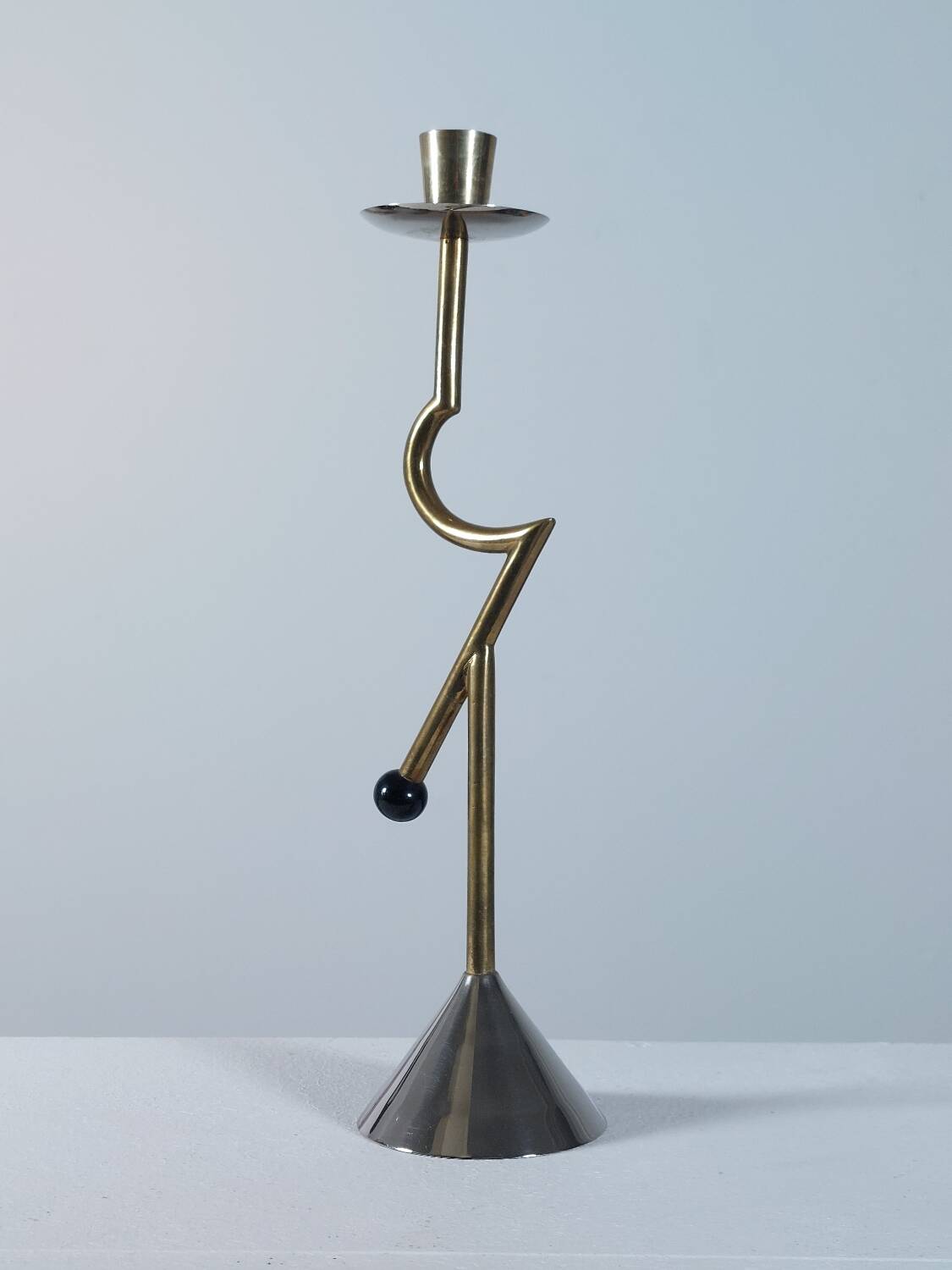 Vintage postmodern sculptural candlestick in chrome brass from the 1980s.