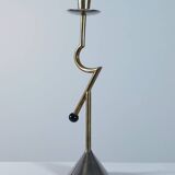 Vintage postmodern sculptural candlestick in chrome brass from the 1980s.