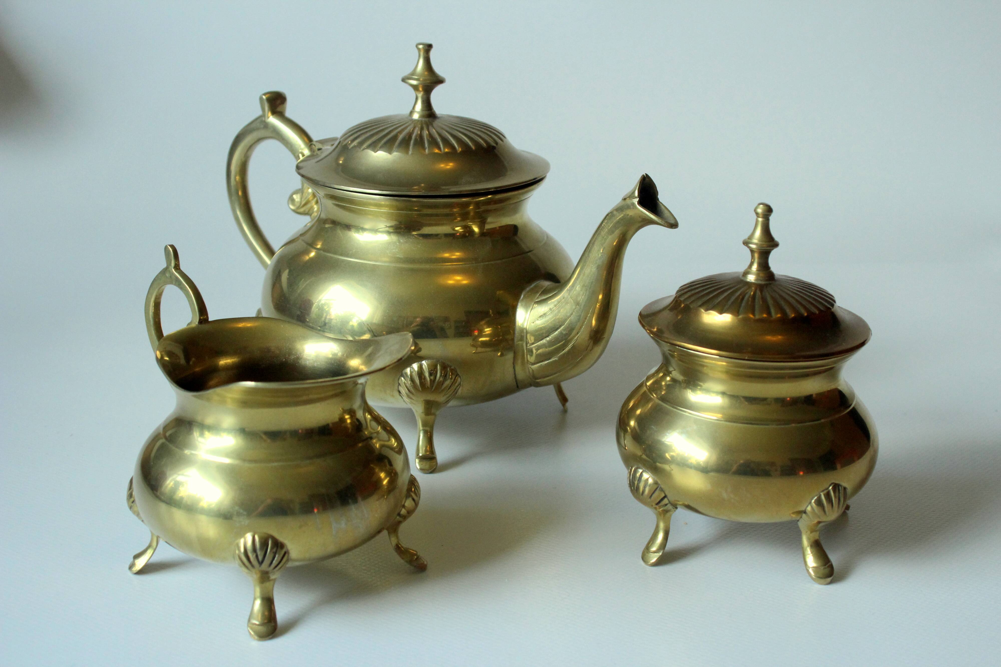 Metal teapot gold plated, inside silver plated, with milk pot and sugar bowl as a set, vintage