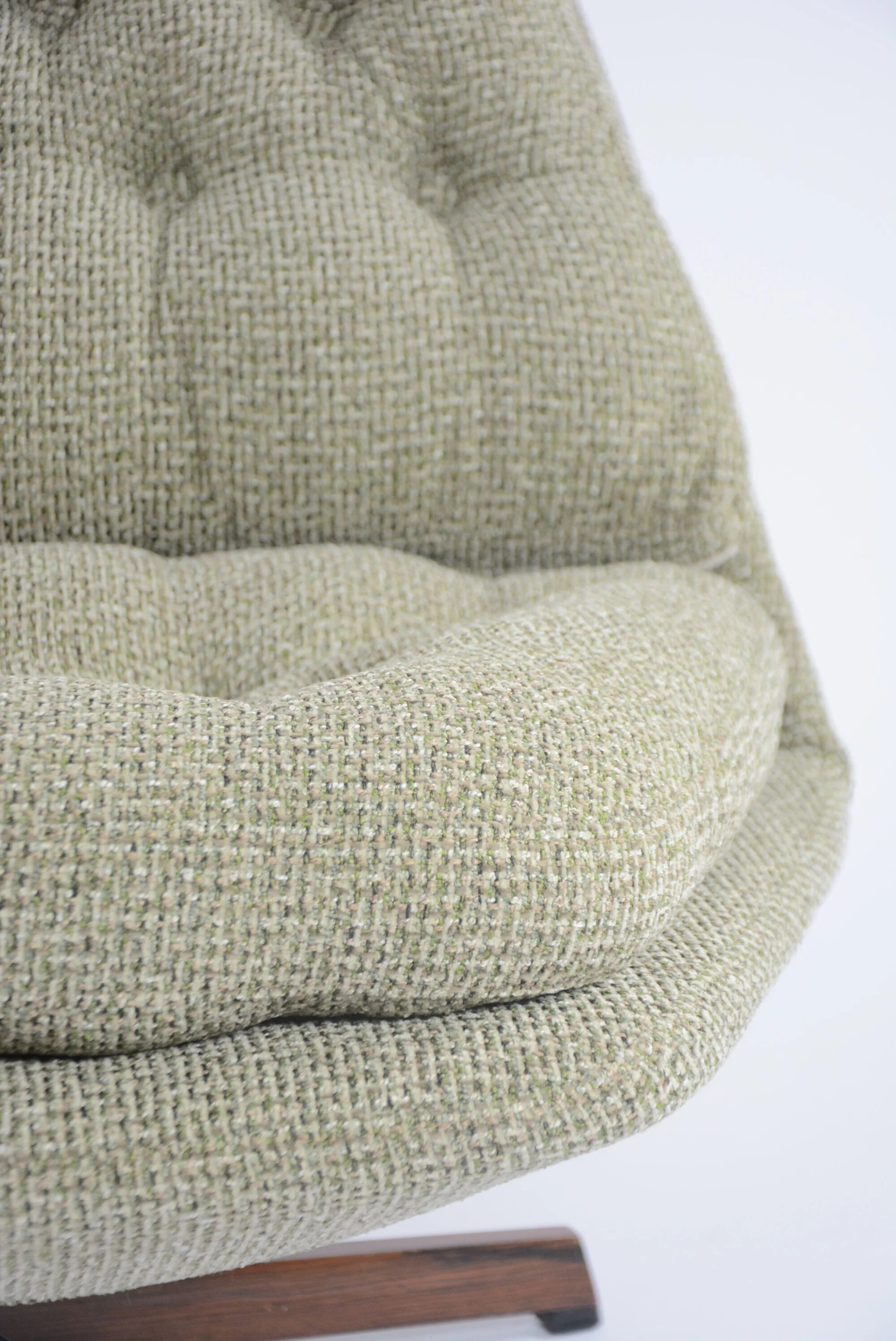 Green swivel Scandinavian armchair