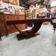 Art Deco dining table with a central cradle base from the 1930s.
