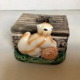 Zoomorphic squirrel box empty pocket