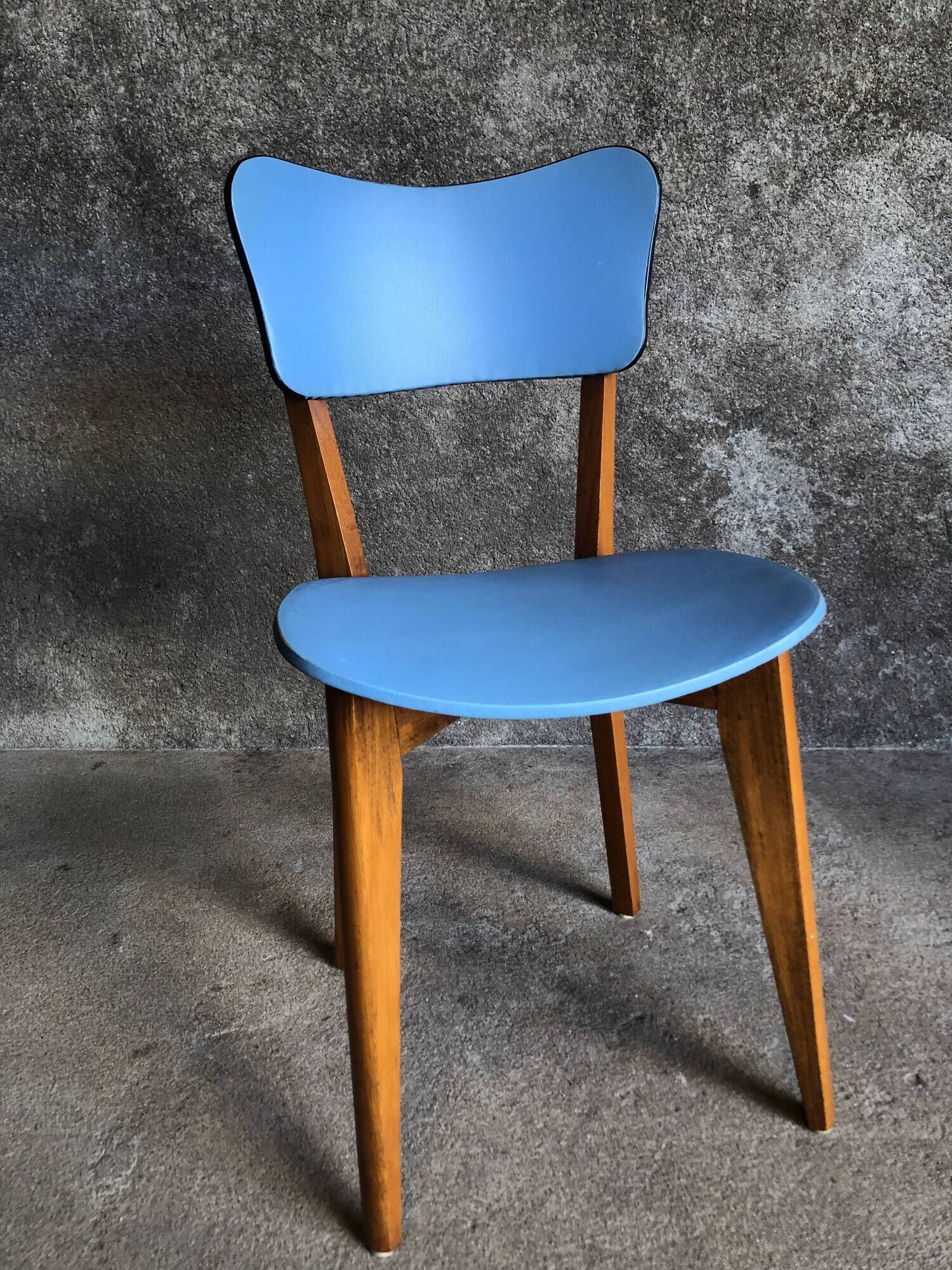 Pair of vintage bistro chairs in wood and light blue vinyl