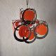 Vintage orange and chrome suspension