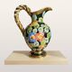 Large vintage ceramic jug from Vallauris, floral decoration and gilding.