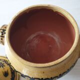 Old covered pot