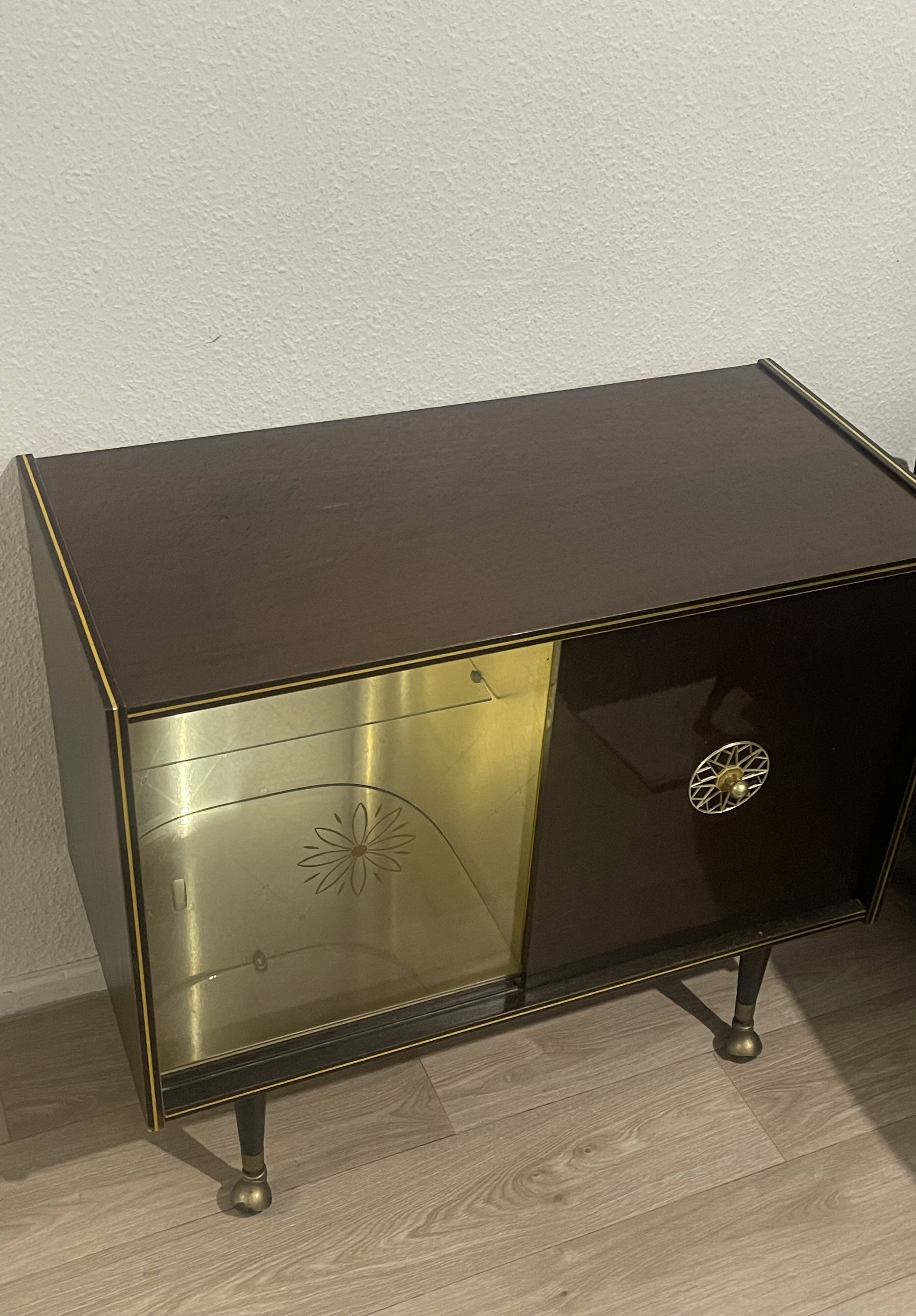 Wood and brass bar cabinet, 1950s.