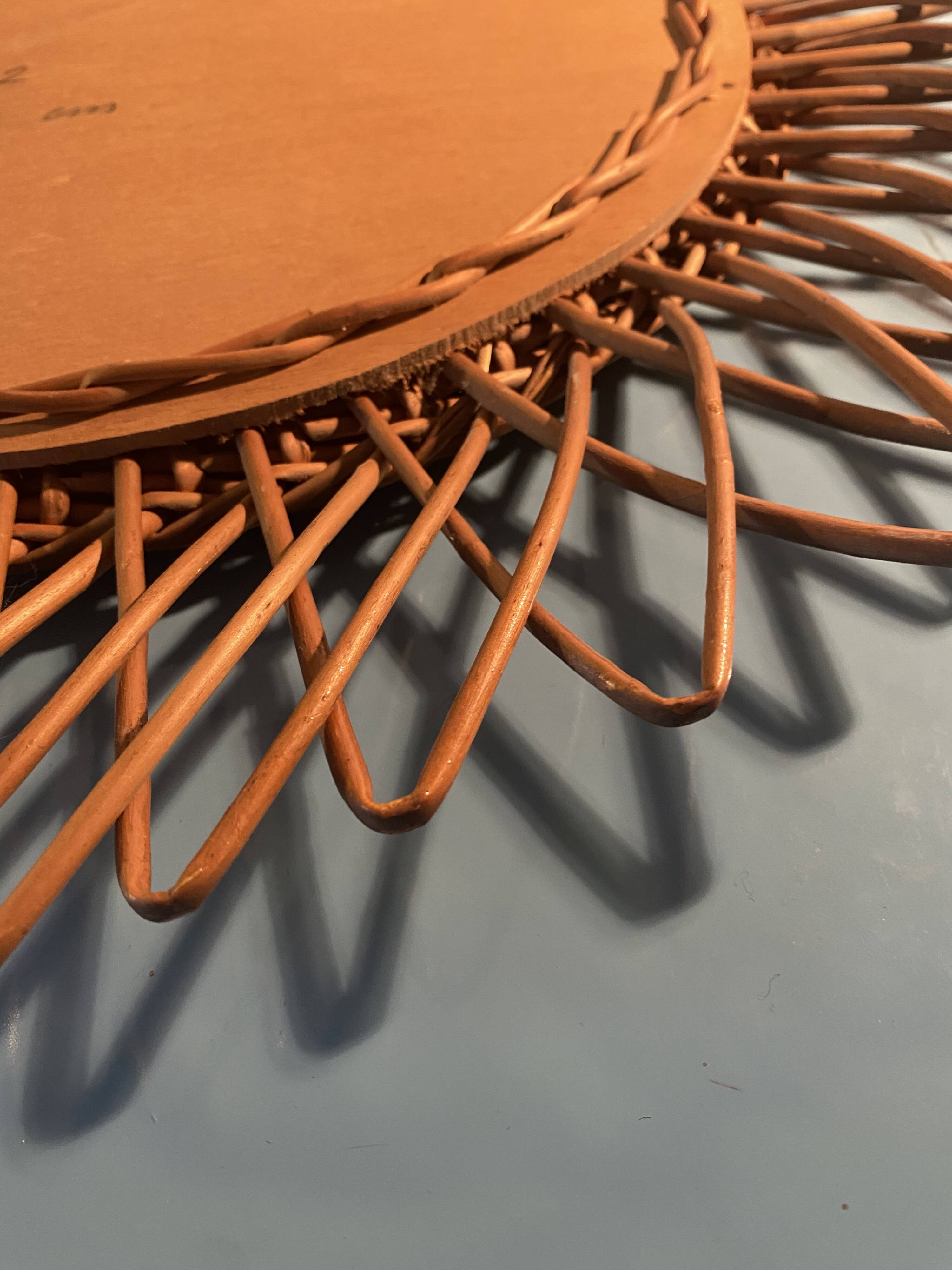 sun rattan mirror