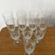 Set of 8 crystal champagne flutes in classic design.
