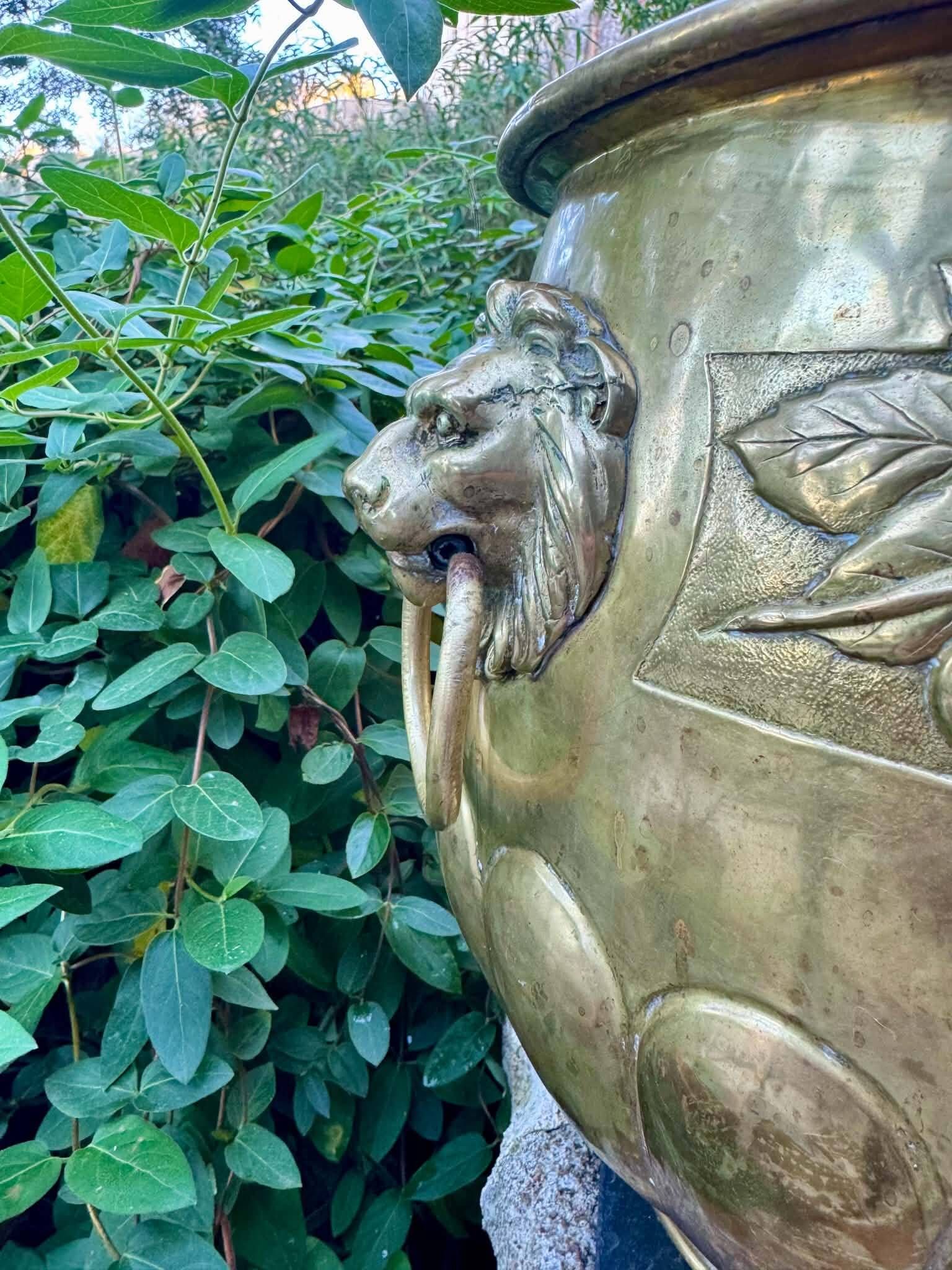 Large brass lion planter with a hallmark from the 19th century.