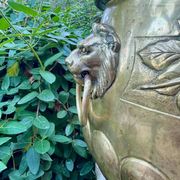 Large brass lion planter with a hallmark from the 19th century.