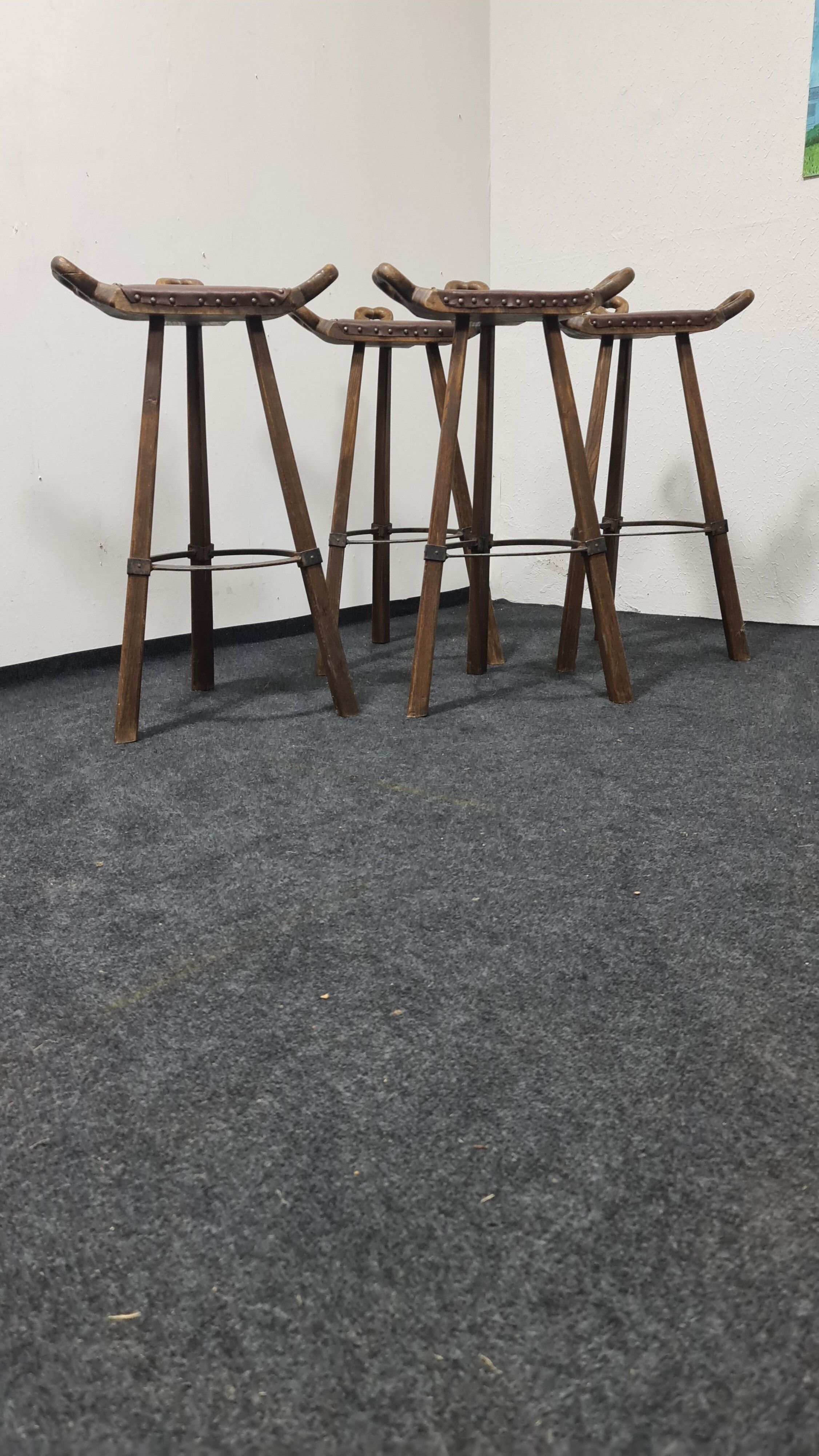 A set of four vintage Spanish Bar stool